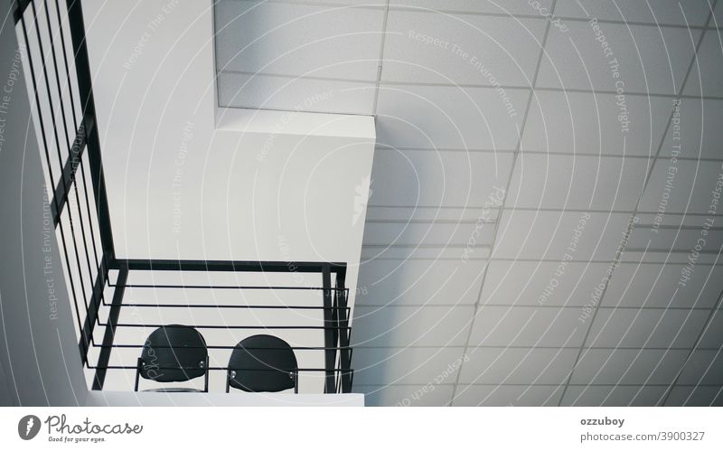 empty chair on second floor Pattern Detail Abstract Structures and shapes Line Arrangement Design Perspective Modern Facade Esthetic Manmade structures
