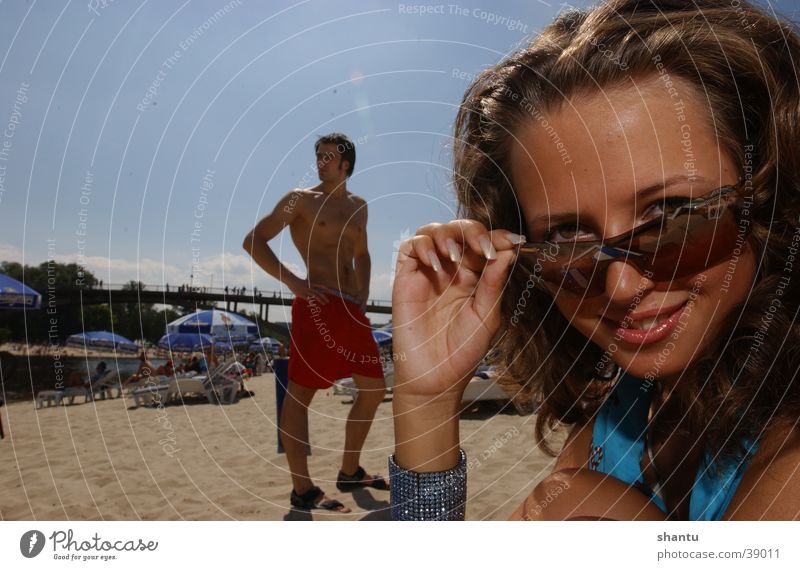 https://www.photocase.com/photos/39011-oh-boy-beach-sunglasses-swimming-trunks-summer-woman-photocase-stock-photo-large.jpeg