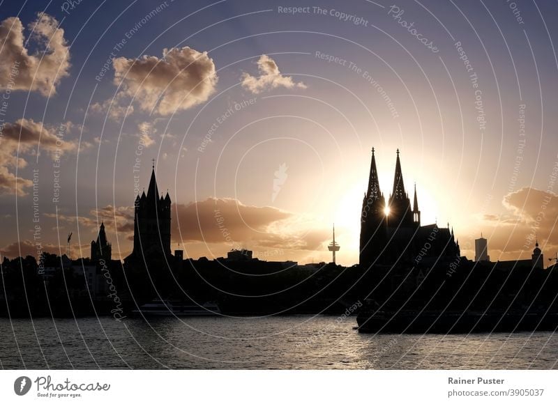 The sun setting in the center of Cologne Cathedral in Cologne, Germany köln cathedral cologne cathedral architecture landmark europe city travel cityscape tower