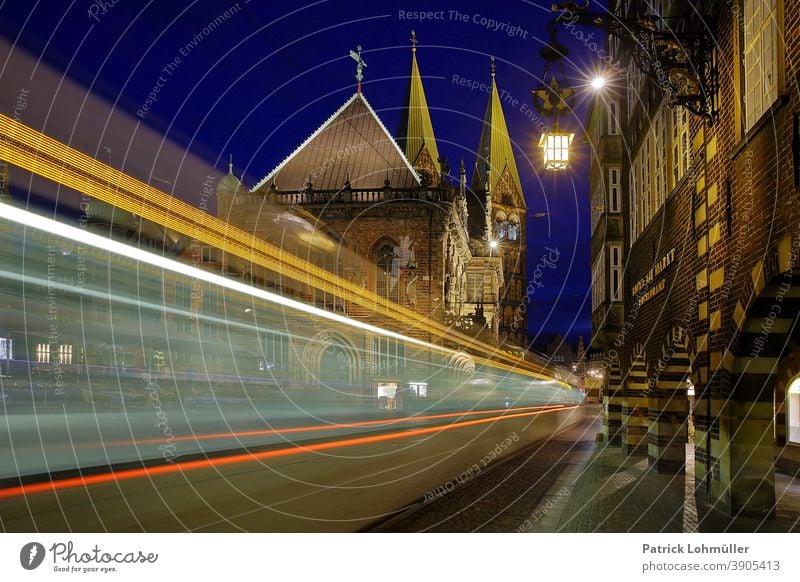 Traffic in Bremen City hall Transport Tram Movement Illuminated Night shot Brick Gothic Sightseeing light track Long exposure vacation travel Tourist Attraction