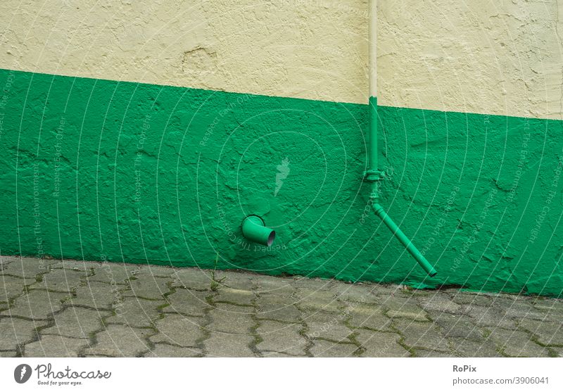 Detail of an old house wall. Wall (barrier) Stone Wall (building) rampart conduit varnished Architecture House (Residential Structure) Town urban Art glaze