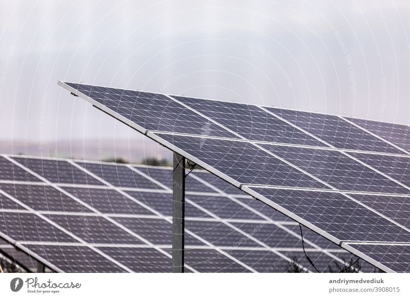 A power plant using renewable solar energy with the sun. Solar cells or photovoltaic cells in solar power plant station turn up skyward absorb the sunlight from the sun. closeup of photo.