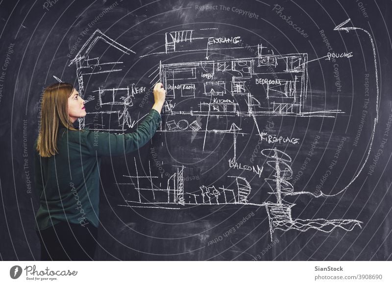 Architect woman sketching new project on chalkboard. blackboard architect architectures drawing business work hipster workplace office meeting construction