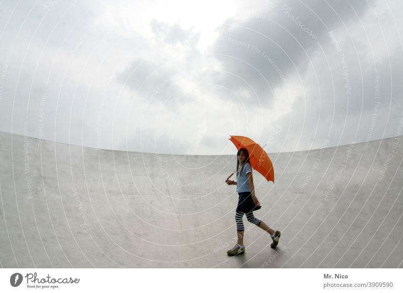 Arrived at the edge Umbrella Sky Clouds Weather Rain Bad weather Red Silver Gray umbrella Orange get wet Shielded sheltered weather conditions Ramp Loneliness