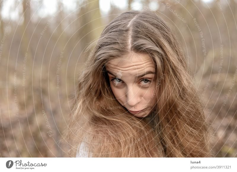 cheerful girl with long hair Girl Brash Youth (Young adults) Impish high-spirited Funny Laughter Rebellious Grimace facial expression Provocative relaxed