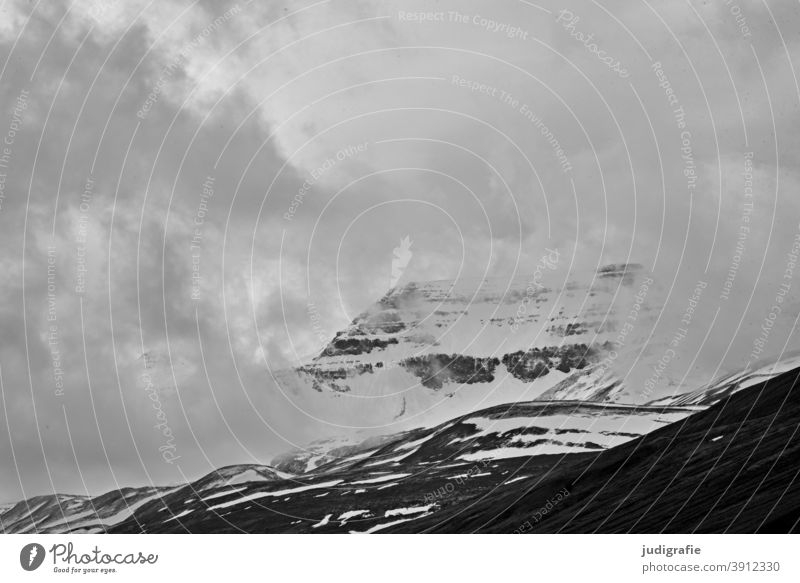 Iceland, mountain with clouds Mountain mountains Snowcapped peak Clouds Climate chill Weather Landscape Deserted Cold Peak Rock naturally Exterior shot Nature