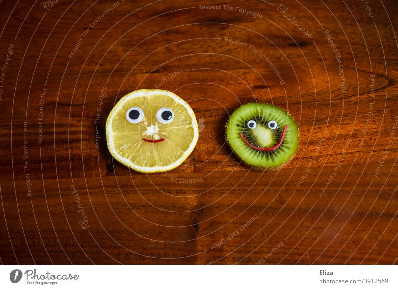 Healthy fruit. Lemon and kiwi with laughing face. salubriously Positive Healthy Eating Kiwifruit Face Nutrition Delicious Fruit Vegetarian diet vegan fruits
