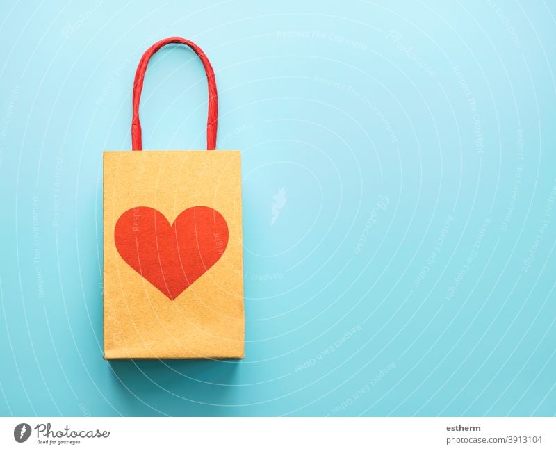 Happy Valentine's Day.Shopping bag with a red heart.Valentine day concept Valentine's day customer merchandise copyspace love sale shopping bag shopping concept