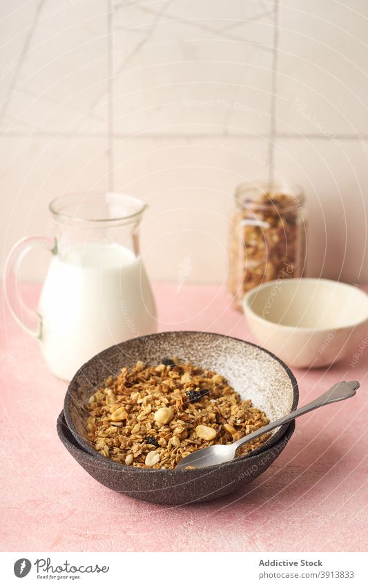 Breakfast with granola and milk breakfast food healthy organic cereal fruit muesli berry bowl grain diet flake snack yogurt fresh natural sweet dessert oat seed
