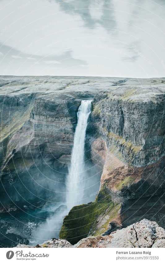 Amazing waterfall in Iceland iceland mountain rock rocks mountains height color clouds landscape nature