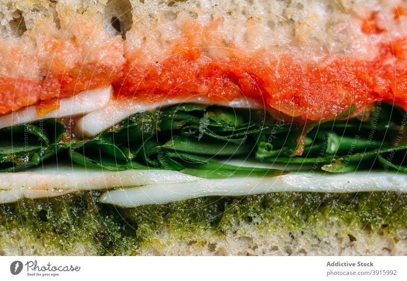 Macro image of healthy sandwich turkey with pesto sauce lunch bread food snack breakfast meal tomato fresh toast dinner vegetable background delicious gourmet