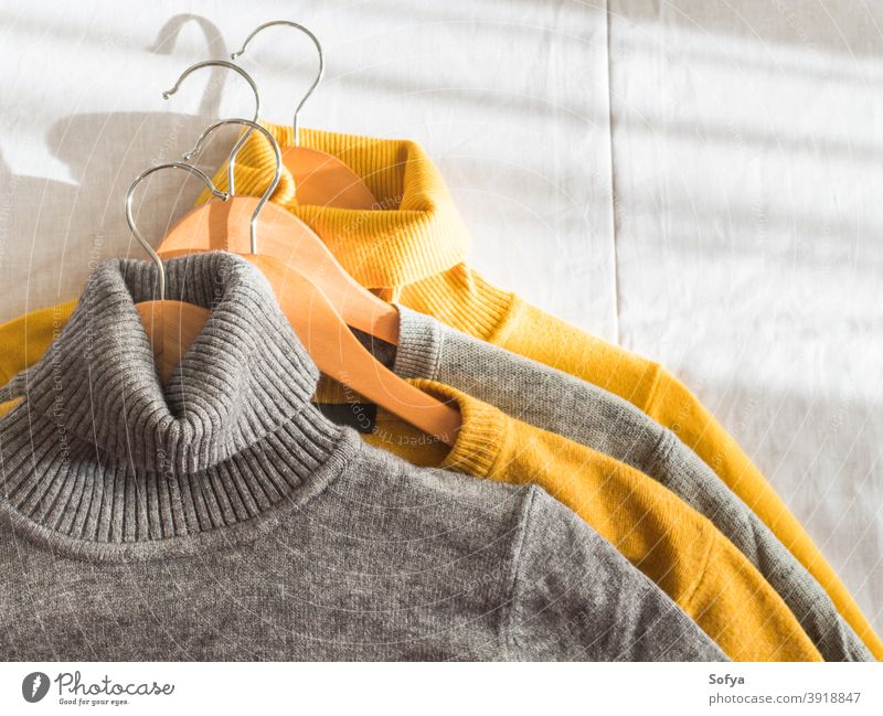 Yellow illuminated color and gray winter sweaters yellow autumn hanger cashmere fall background knit cozy fashion warm knitwear fabric soft woolen girl above