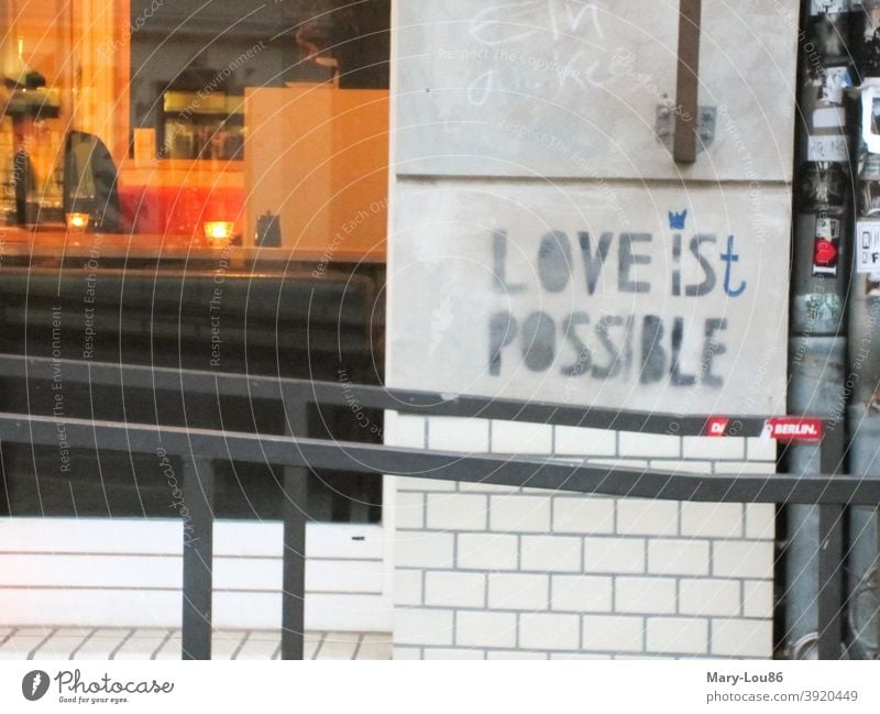 Saying on wall "Love is(t) possible" saying Wall (building) Love is possible Roadhouse graffiti typography street art urban Exterior shot Romance Graffiti