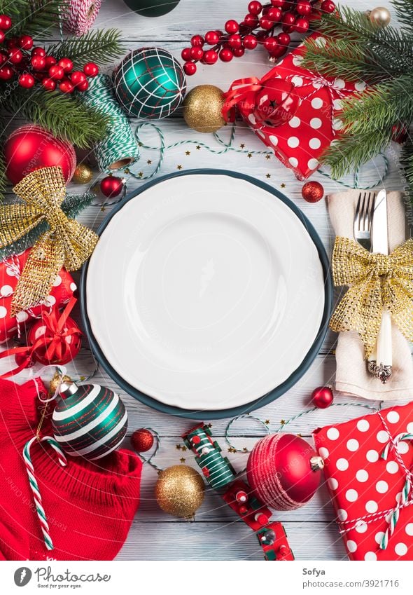 Christmas dinner table plate setting with decor christmas polka dot dish background food red party lunch frame flat lay celebrate festive tree design vintage