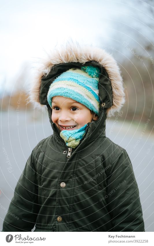 picture of smiling black boy outdoors african american boys carefree casual clothing child childhood children cold emotion expression freedom happiness happy