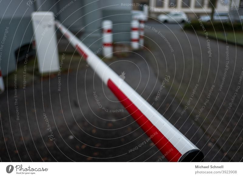 Red and white barrier cordon Control barrier Reddish white Barrier Safety Exterior shot Structures and shapes No through road Transit prohibited