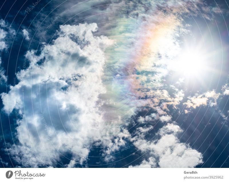 blue sky white clouds sun and rainbow air atmosphere azure background climate cloudiness cloudscape cloudy color cumulus day environment fluffy front haze