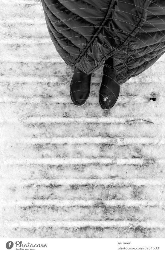 Standing in the snow Snow planks boardwalk Exterior shot Winter Lanes & trails Cold Boots Coat Bird's-eye view White Human being Black Frost Ice 1 person chill