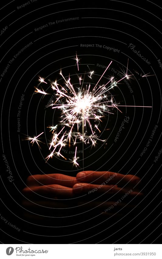 to a new .... stars Firecracker Sparkler Hand New Year's Eve Light (Natural Phenomenon) Night Feasts & Celebrations Glittering Party Bright Dark