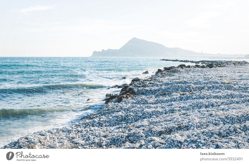 The destroyed beach in Altea after storm Gloria in January 2020 with view on mountain range, Altea, Costa Blanca, Spain altea spain coast mediterranean spanish