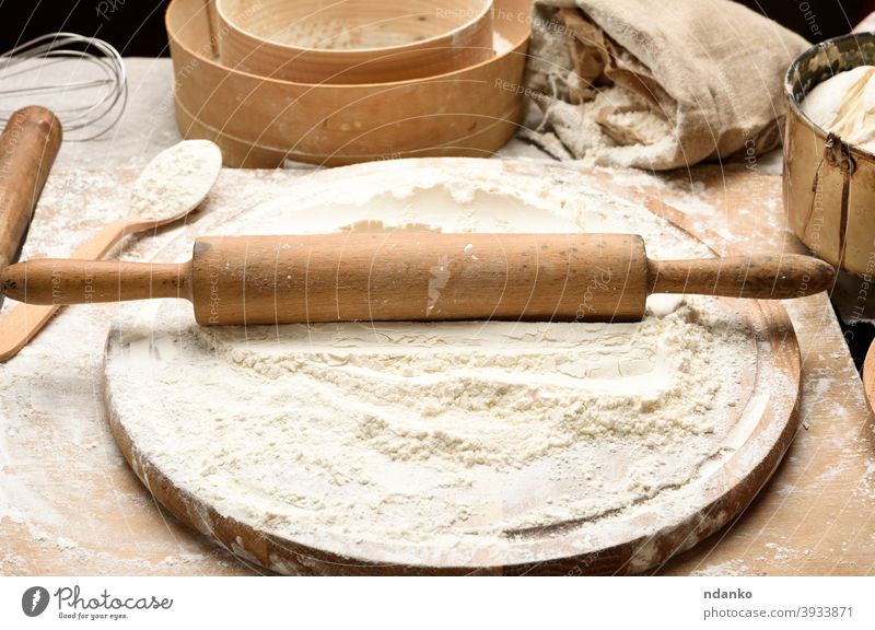 white wheat flour and wooden rolling pin on board, baking ingredients sieve dough food fresh freshness grain homemade kitchen meal pastry powder preparation raw