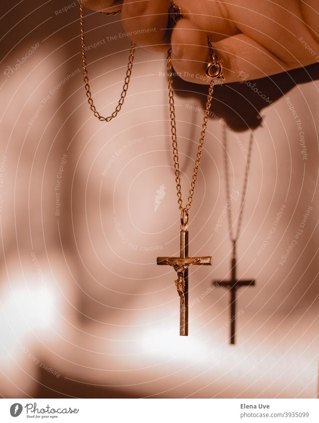 Pendant of crucified Christ with warm lights and shadow. crucifixion Christianity Religion and faith Shadow Moody mood Christmas Jesus Christ Hope Wallpaper