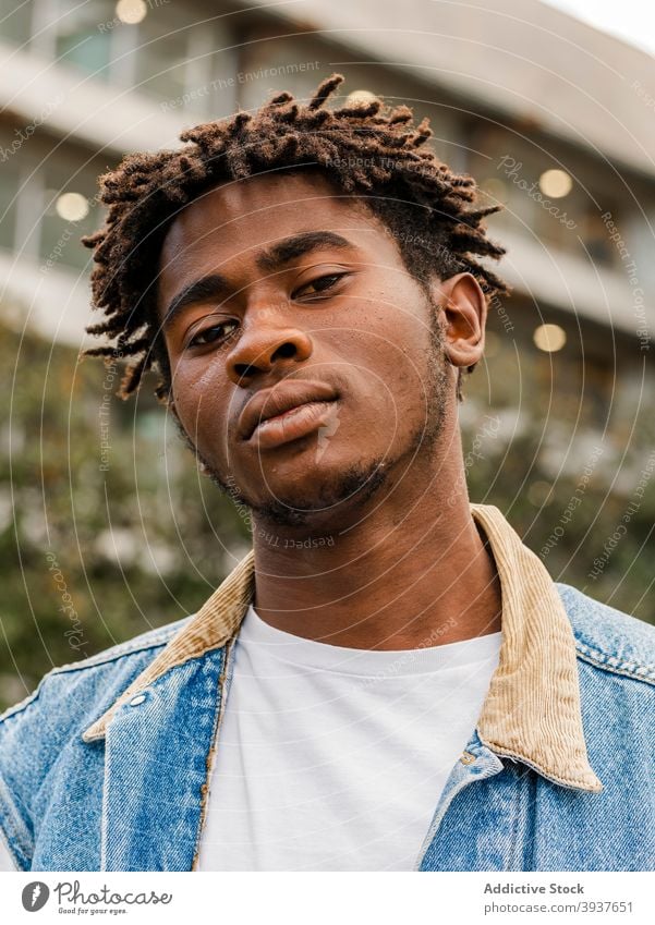 young man with modern hairstyle - a Royalty Free Stock Photo from Photocase