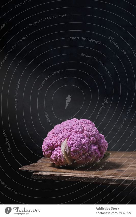 Purple cauliflower on wooden table purple vegetable studio dark food healthy delicious fresh ripe healthy food desk natural ingredient organic gourmet vegan