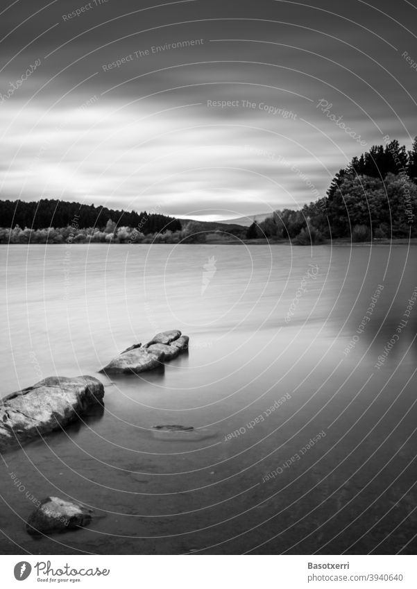 Dawn at the reservoir in black and white. Ullíbarri-Gamboa, Álava, Basque Country, Spain alava Reservoir Long exposure Black & white photo Exterior shot