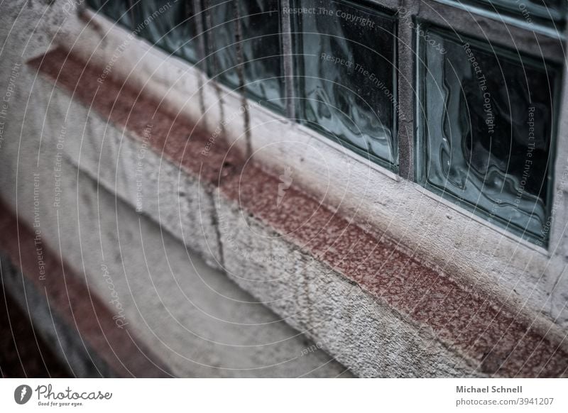 Old glass blocks on an old house Glass block Window Exterior shot Facade Colour photo Deserted Wall (building) Wall (barrier) House (Residential Structure)