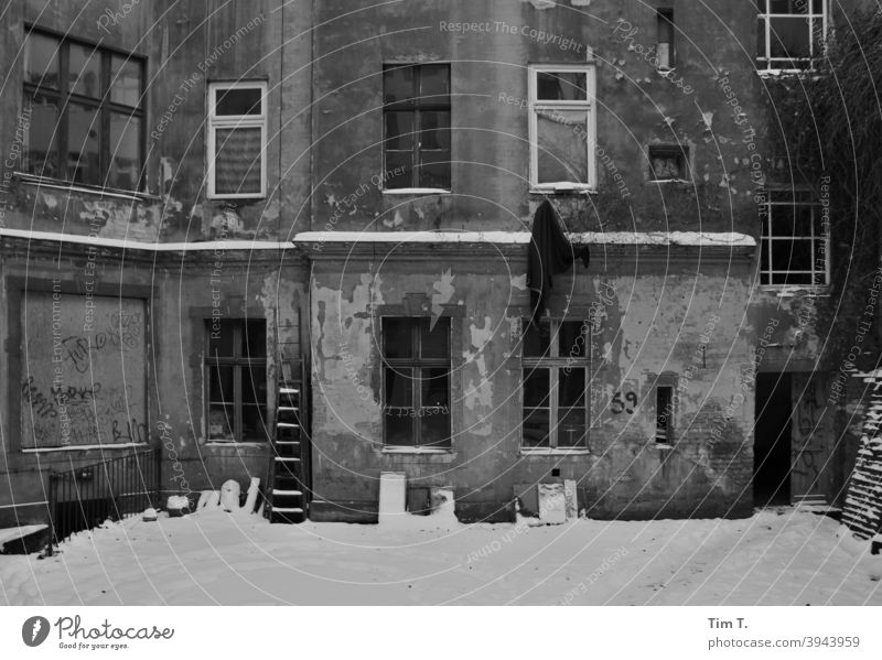 a snowy old backyard in Prenzlauer Berg Berlin b/w B/W Winter Snow Old building Black & white photo Architecture B&W Window Exterior shot Day Building Downtown