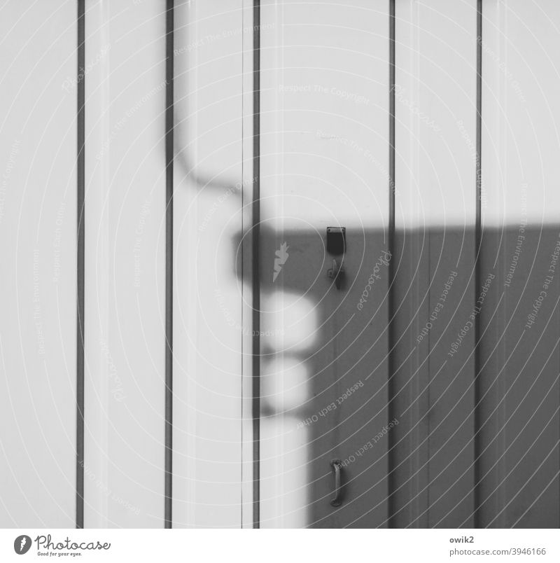 basic data Garage Shadow Garage door Gray White Black & white photo lines Tin door handle Deserted Exterior shot Goal Day Wall (building)