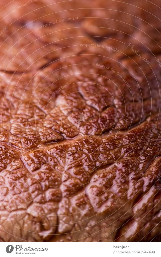 Close up of a grilled steak Steak Meat texture grilled meat background Close-up macro Top Barbecue (apparatus) Wood Looking Eating board Vine Sirloin seethed