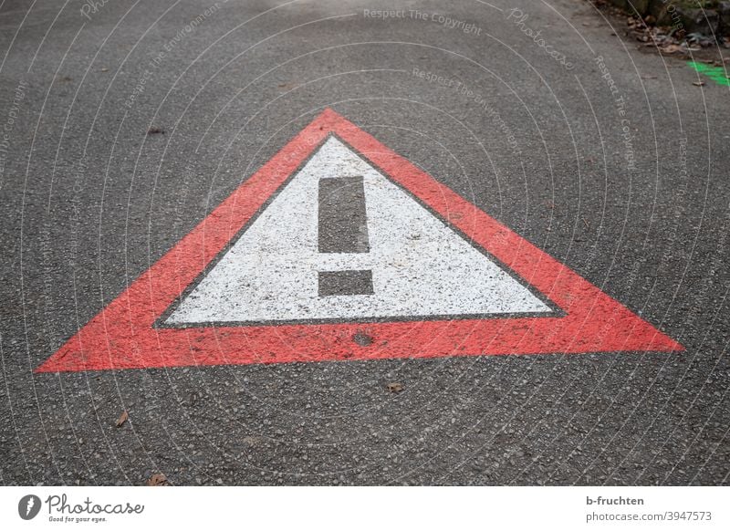 Traffic sign painted on the road, danger sign, danger spot Caution Road sign Sign symbol call sign Street Asphalt peril Painting (action, artwork) off