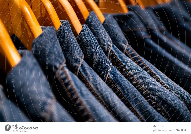 Close-Up Photo of Denim Jeans on a Clothing Rack · Free Stock Photo