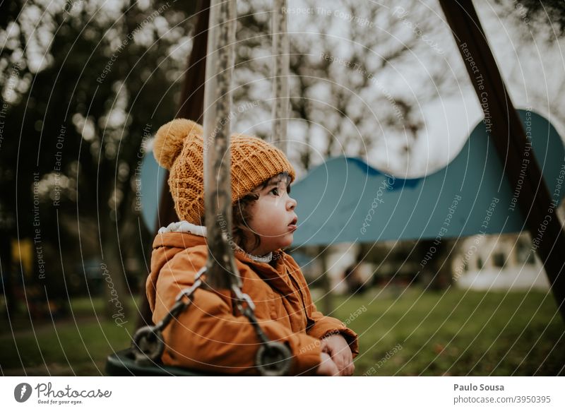 Child playing on playground Slide Playground childhood Girl 1 - 3 years Happy Joy Day Human being Colour photo Infancy Exterior shot Playing Kindergarten