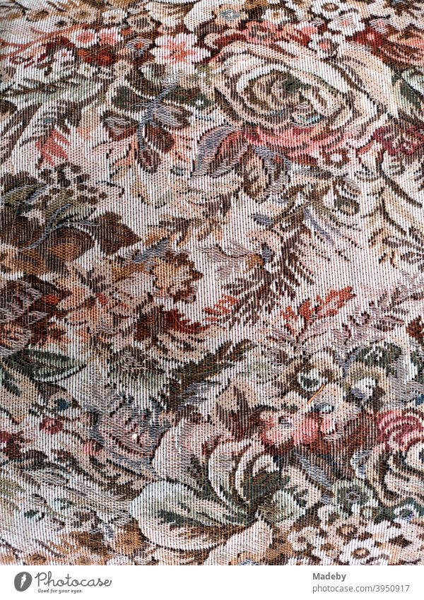 Fabric pattern with flowers, branches and plants of an old armchair in the bulky waste Furniture Cloth fabric cover Armchair Armchair cover Flowery pattern
