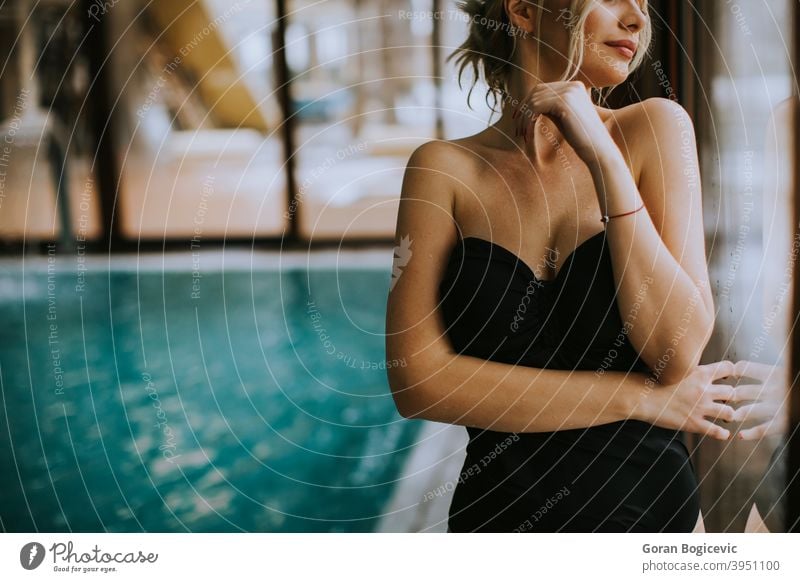 Young slim women in swimming pool - a Royalty Free Stock Photo