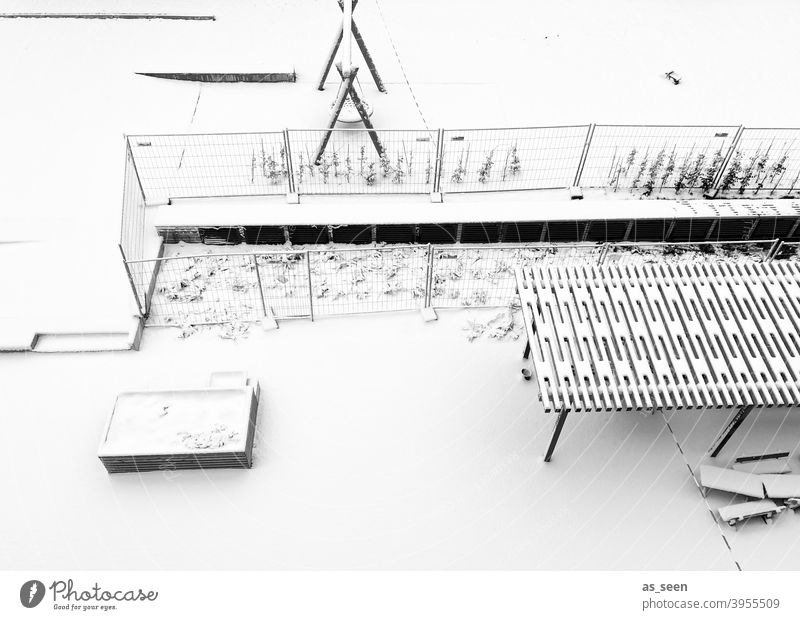 Snowy playground Playground Winter Swing Cold graphically Bird's-eye view Exterior shot Deserted To swing Infancy forsake sb./sth. Day Child Loneliness Calm