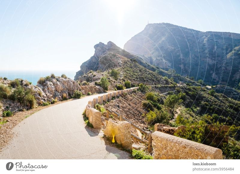 beautiful walking path along steep cliffs along the ocean in the natural park 'Serra Gelada' in Albir, Spain albir serra gelada mediterranean spain shore sea