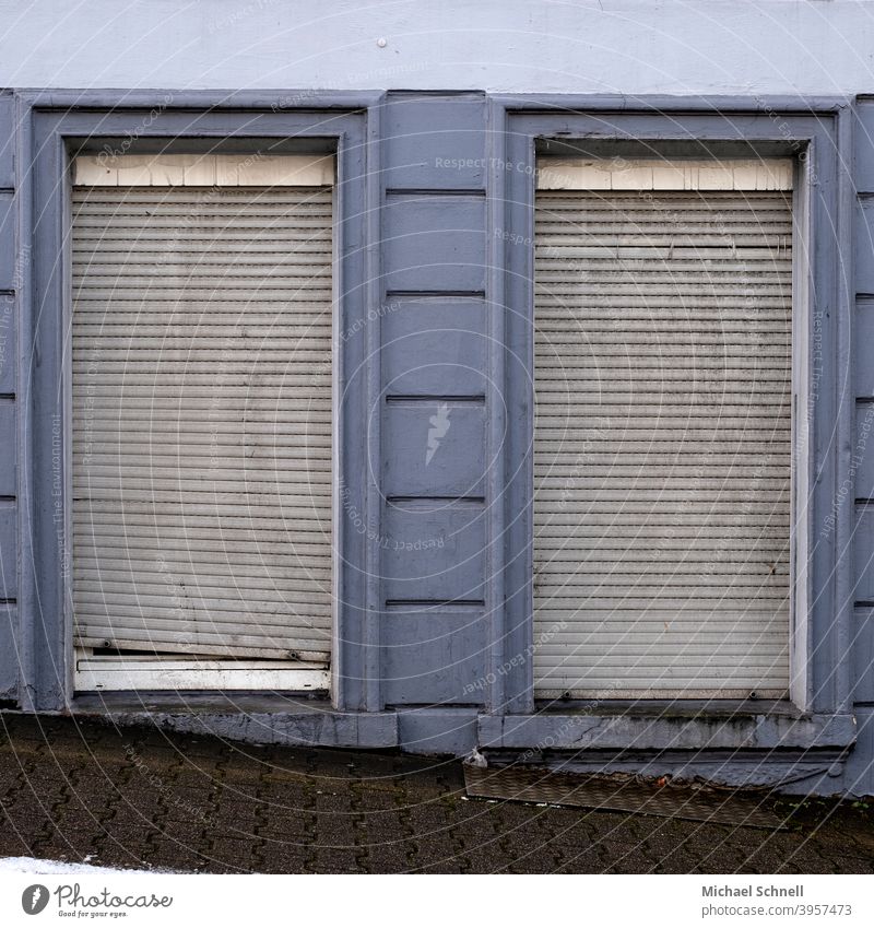 Old grey shutters on an old house roller shutter Gray Blue Closed Window Facade Gloomy Wall (building) Deserted Roller shutter Decline