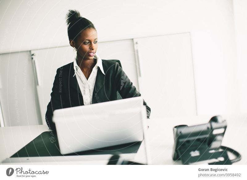 Business Girl Sitting at Desk Stock Image - Image of person