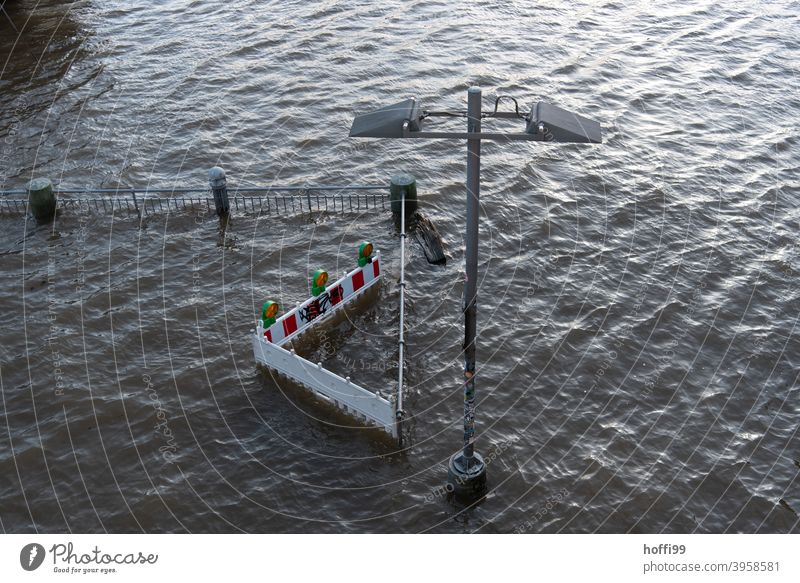 High water floods the construction site barrier Flood High tide spring tide construction site safety Construction site Water Deluge River Wet Climate change