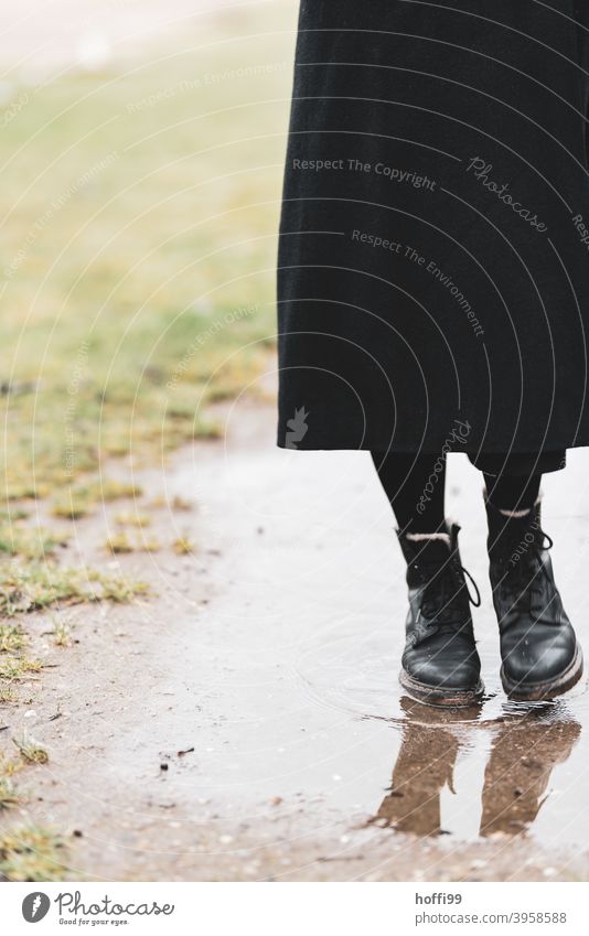 boots in the puddle keep feet dry Boots Footwear Woman Legs Clothing Feminine Stand Puddle puddle mirroring Fashion Adults Feet Youth (Young adults)