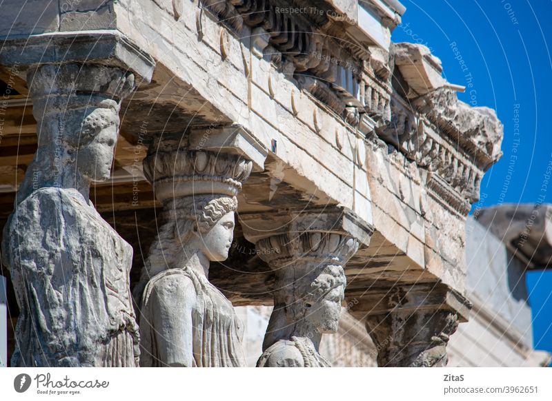 Closeup of Caryatids from Erechthion temple at Acropolis acropolis greece athens caryatids statue statues ancient old building exterior erechthion greek history