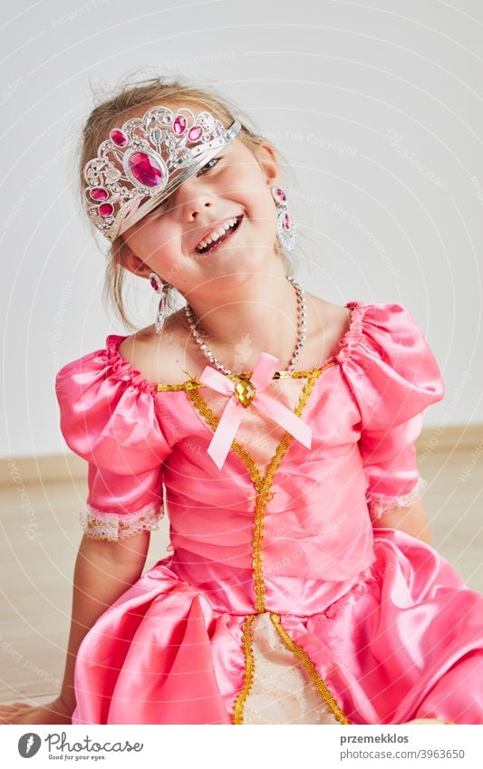 Little girl enjoying her role of princess. Adorable cute 5-6 years