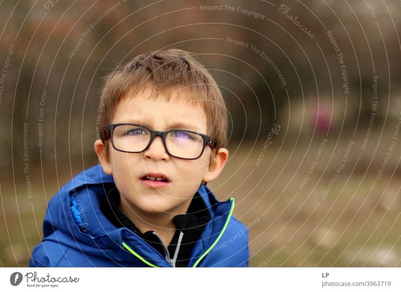 portrait of a boy wearing glasses Copy Space right Exterior shot Multicoloured Looking Problem solving Creativity Complex Inspiration Innovative Hope Interest