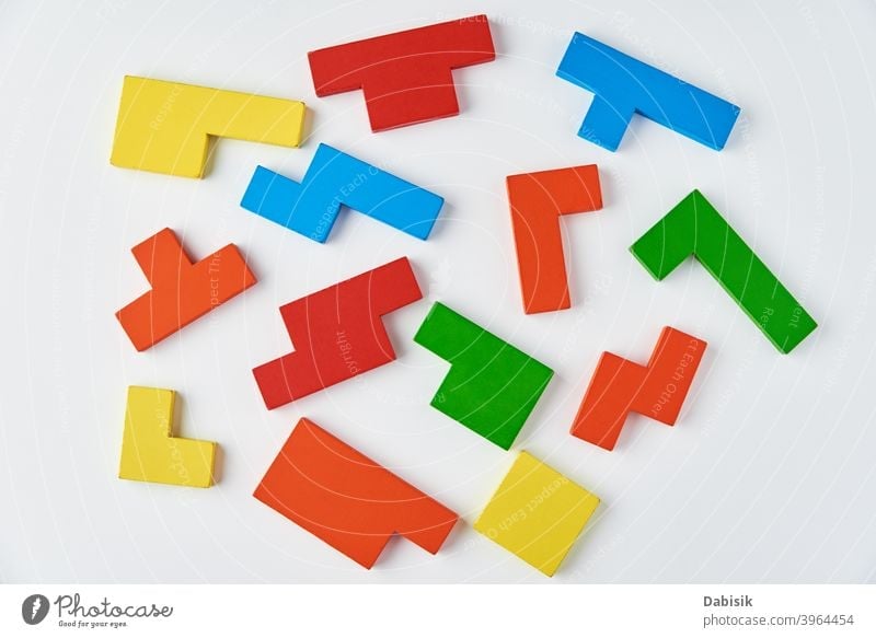Different wooden blocks on white background. Concept of logical thinking and education puzzle geometric concept creative abstract business colorful connect