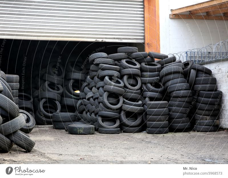 Tyre trade Tire Tire tread Rubber Black scrap tyres Recycling Scrap metal Disposal stacked Trash Waste management recycling yard Special waste Material Heap