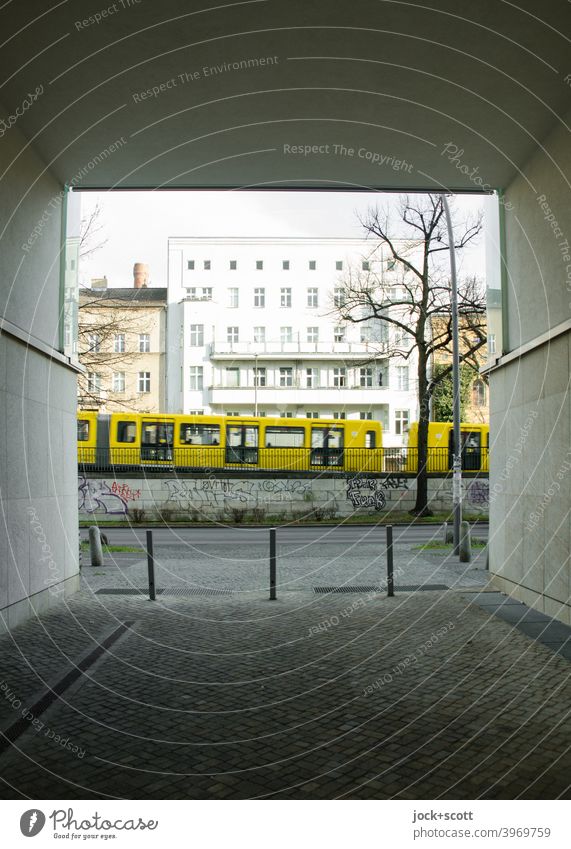 On a winter day the subway passes by in the direction of Mitte Schönhauser Allee Prenzlauer Berg Architecture Underground City Sidewalk Street